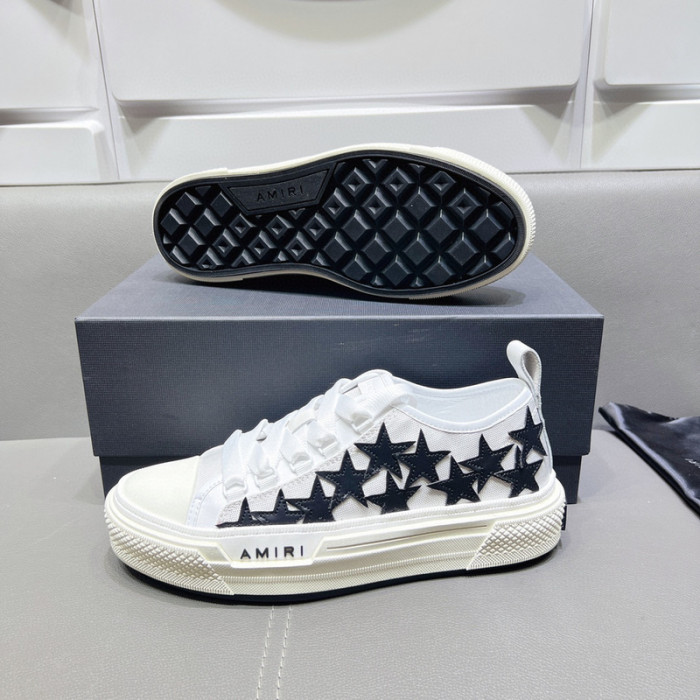 amiri* appliquéd leather and canvas sneakers