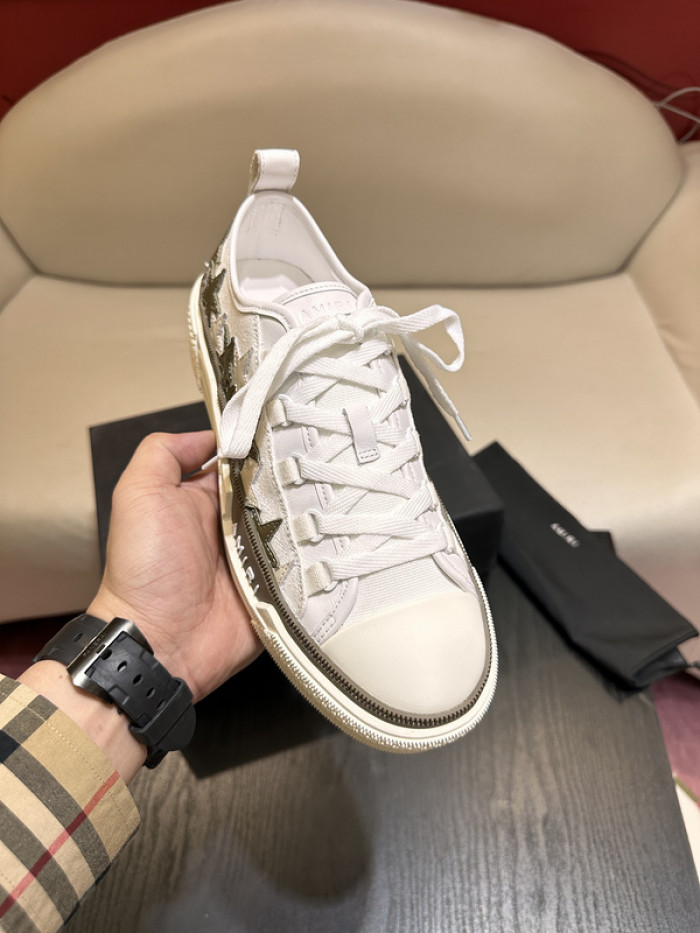 amiri* appliquéd leather and canvas sneakers