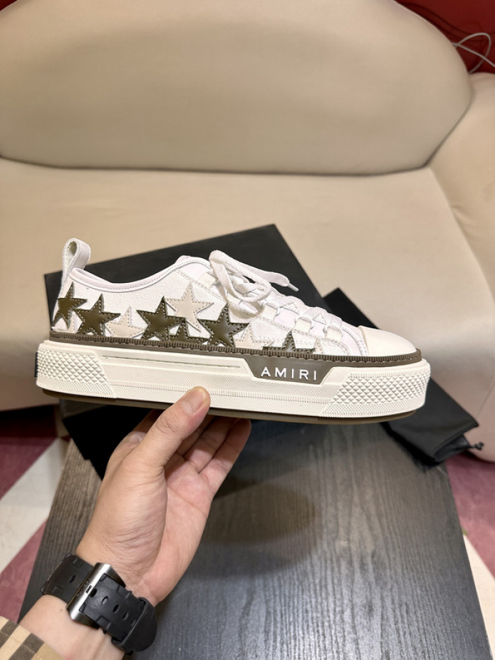 amiri* appliquéd leather and canvas sneakers