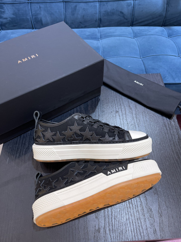 amiri* appliquéd leather and canvas sneakers