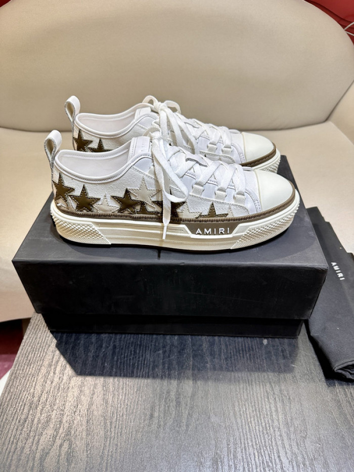 amiri* appliquéd leather and canvas sneakers